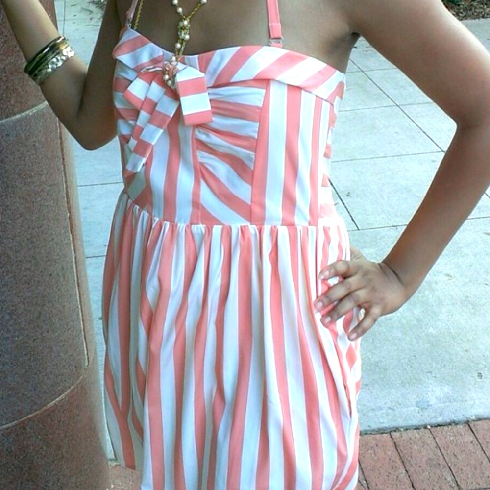 Coral and white baby doll dress.